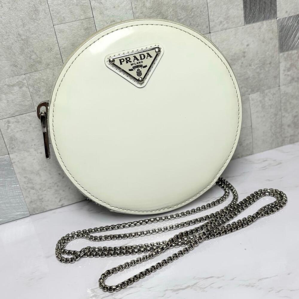 Prada round chain shoulder Clutch triangular plate leather Beige white bag